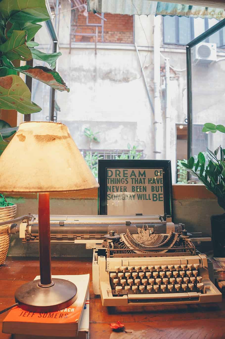 A-table-lamp-accentuating-a-vintage-typewriter