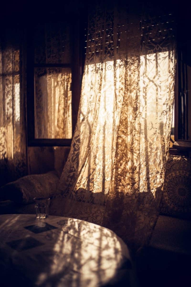 floral-curtains-over-an-open-window