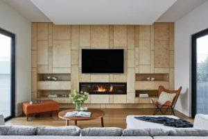 Bright-living-room-with-a-TV-and-electric-fireplace